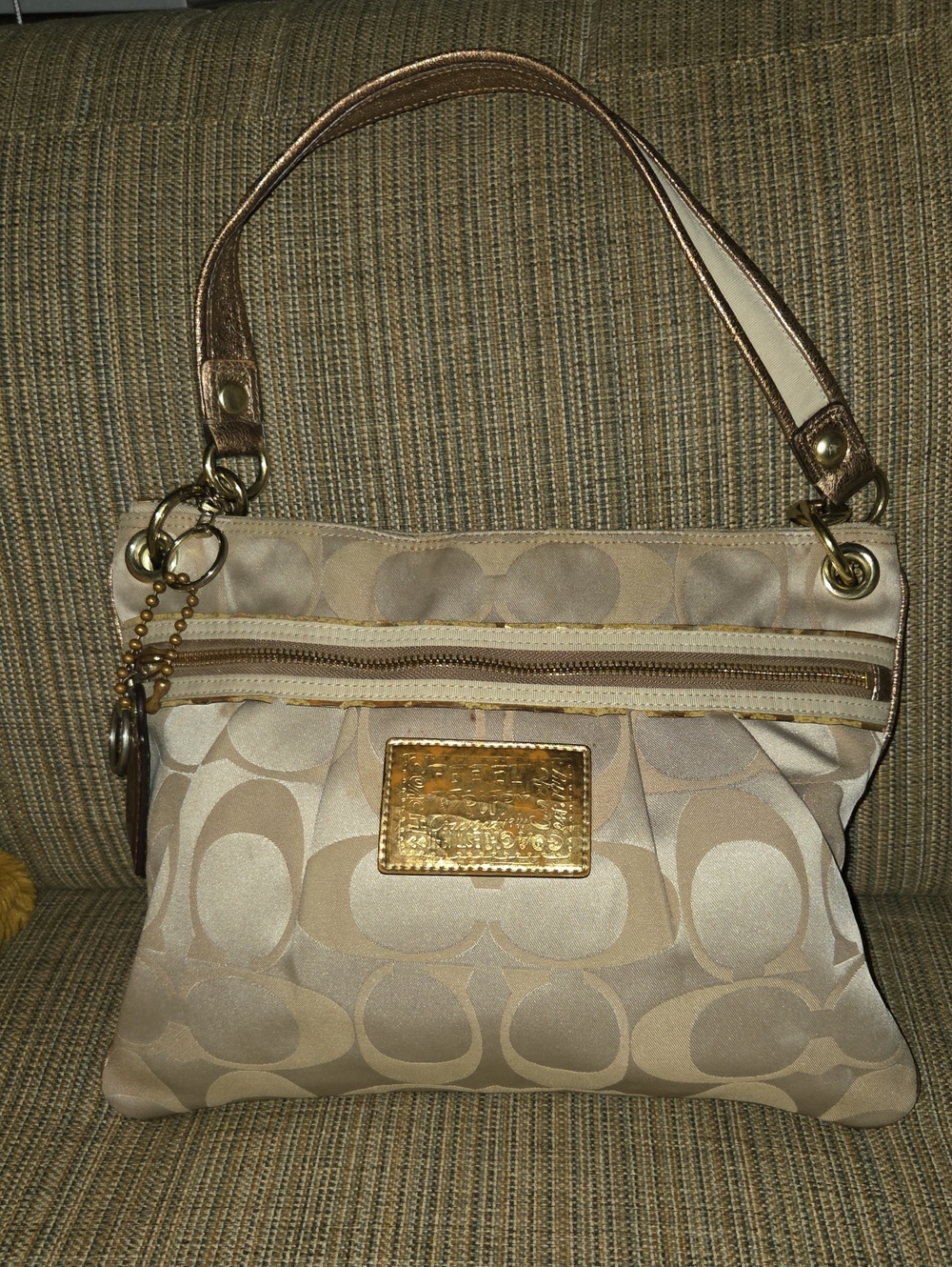 Coach Poppy Beige Signature Canvas Shoulder Bag with Aqua interior.